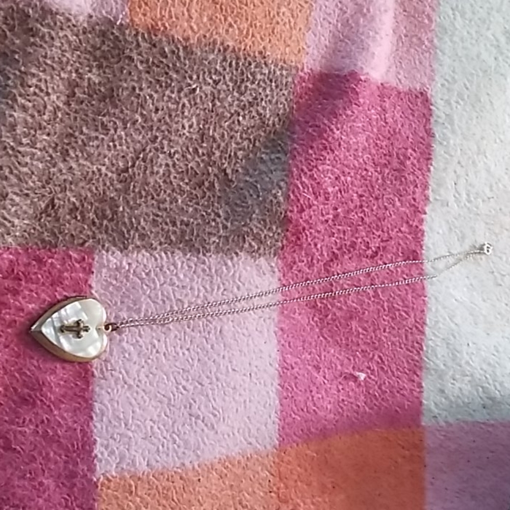 Little girls necklace opal what's a cross inside